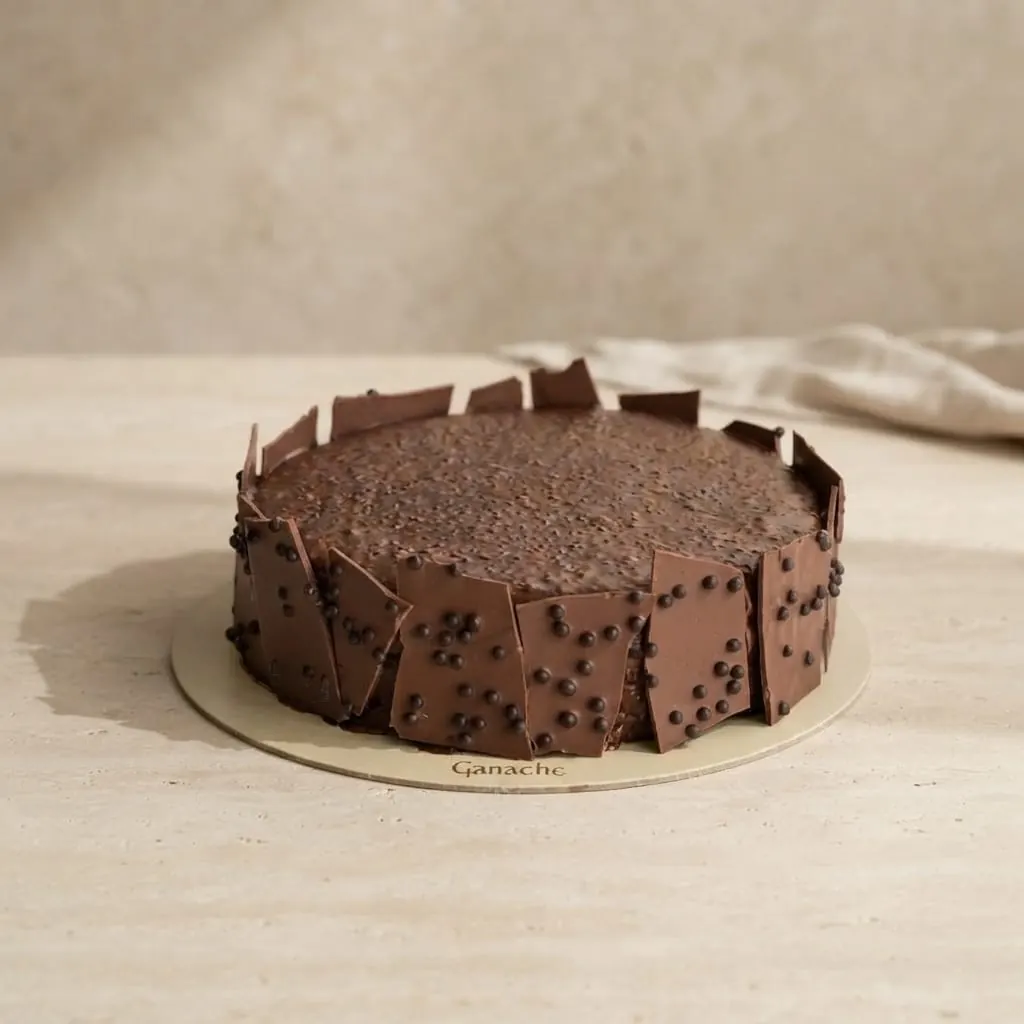Ganache chocolate cake with delicate chocolate shards